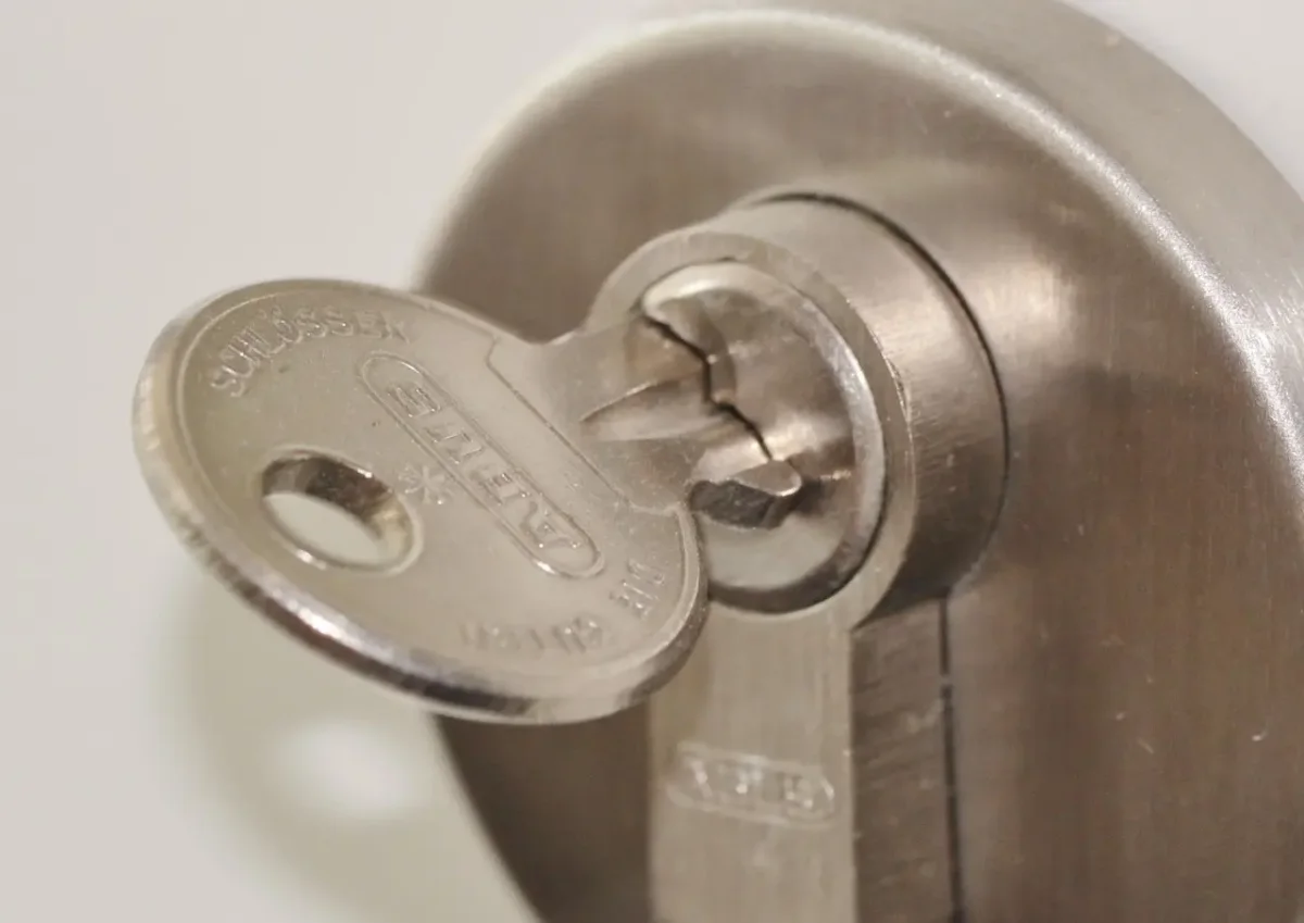 Key inserted in a door lock cylinder – call a locksmith Kings Heath service from Locksmith Birmingham, available 24 hours